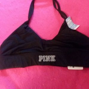PINK.  BLACK AND WHITE SPORTS BRA.